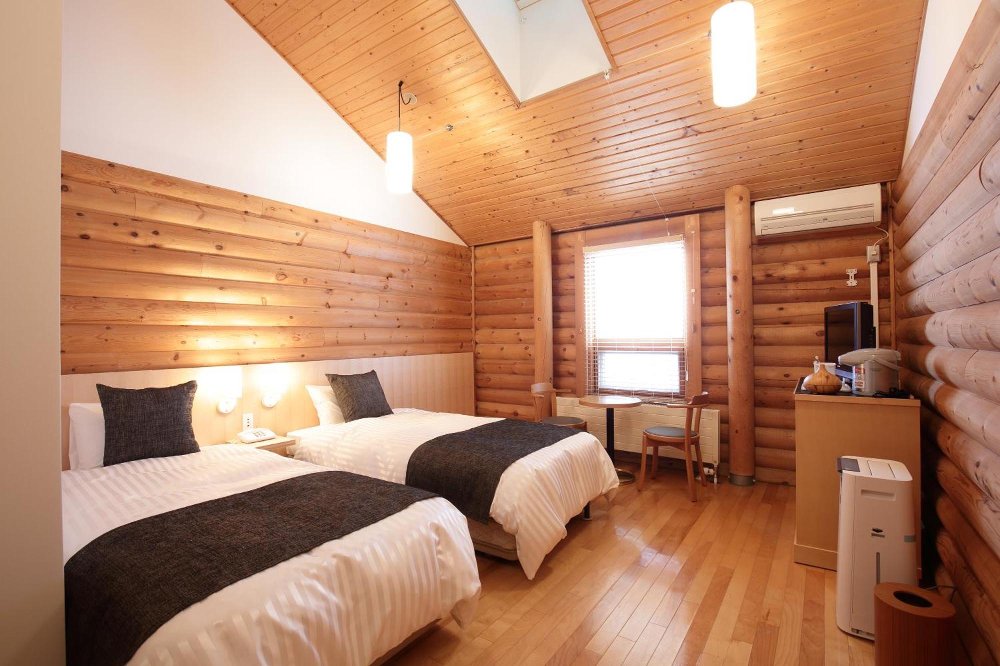 Log Hotel The Maple Lodge Iwamizawa Buitenkant foto