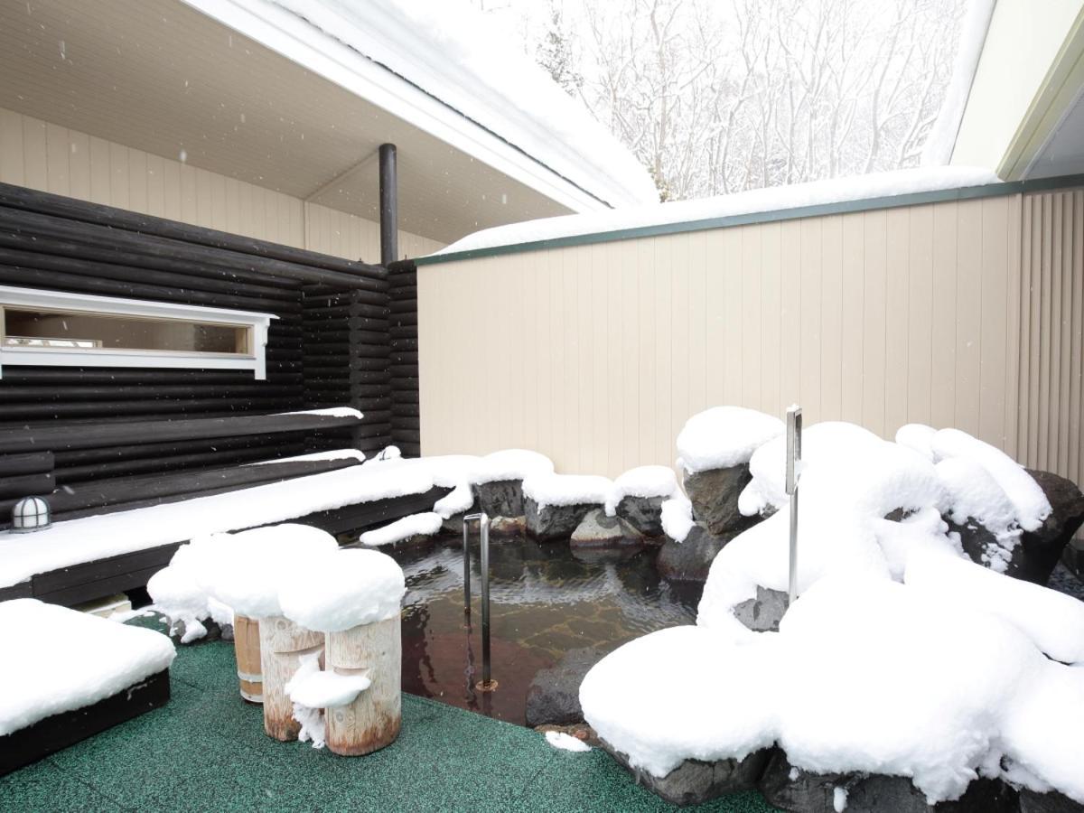 Log Hotel The Maple Lodge Iwamizawa Buitenkant foto